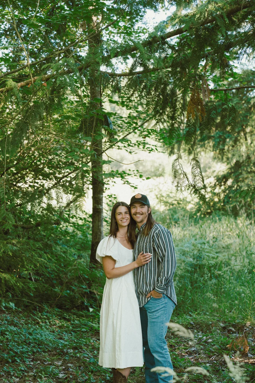 The family owners of Pure Guard Pest Control standing together near their Lake Stevens, WA home